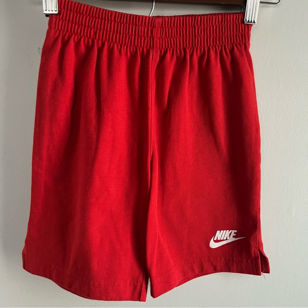 Nike Red Athletic Shorts with White Swoosh